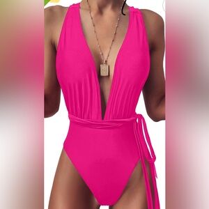 Hot pink swimsuit with a Deep V and backless